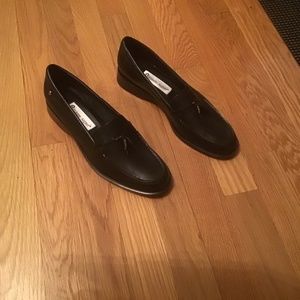 Black leather loafers